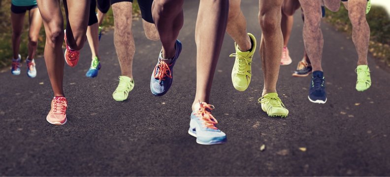 Composite image of close up of sportsman legs running 