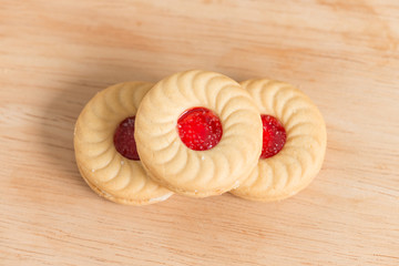 Butter cookies with strawberry jam.