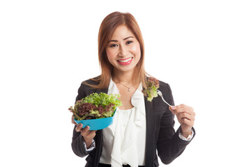 Healthy Asian business woman with salad