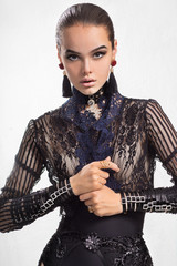 Woman in fashionable black lace blouse