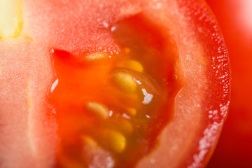 Tomatoes on wooden surface. Selective focus