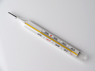 thermometer on a gray background