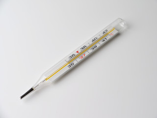 thermometer on a gray background