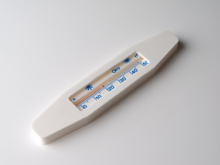 thermometer on a gray background