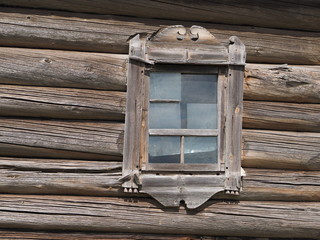 window on the wooden wall