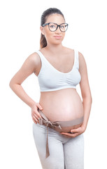 Pregnant woman over white