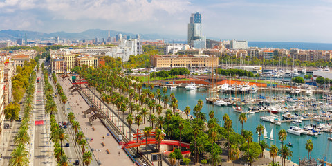 Aerial panoramic view over Passeig de Colom or Columbus avenue, La Barceloneta and Port Vell marina from Christopher Columbus monument in Barcelona, Catalonia, Spain - obrazy, fototapety, plakaty