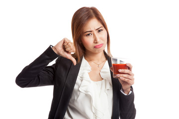 Asian woman thumbs down  hate tomato juice