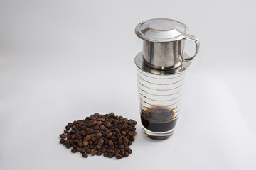 Coffee dripping in vietnamese style with filter, brewing method.