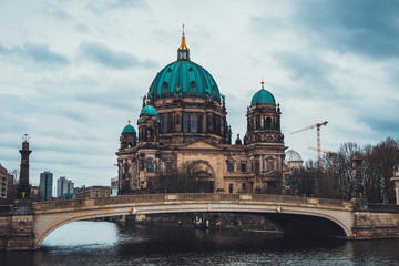 Fototapeta na wymiar Berlin Cathedral and Bridge Crossing River Spree