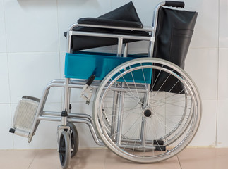 Fototapeta na wymiar Folded Wheelchair in Hospital.