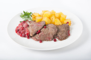 Steak with cranberry sauce