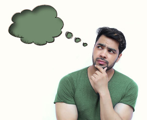 Young Indian Man thinking of thought bubble on white Background © Redshinestudio