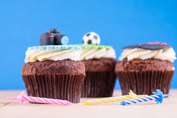 Delicious cupcakes on table