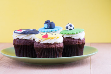 Delicious cupcakes on table