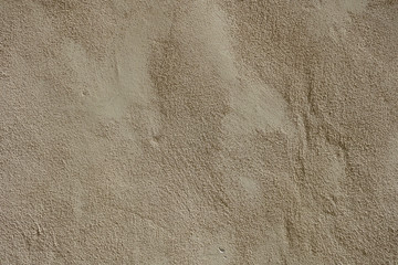 Rough sandy texture stucco wall background