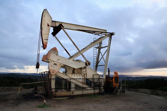 Derricks in oil well, California