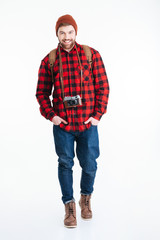 Fototapeta premium Smiling male tourist looking at camera