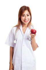 Young Asian female doctor show apple