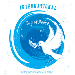 Single dove carrying an olive branch on a circular brush stroke design with grungy effect on a white background for International Peace Day