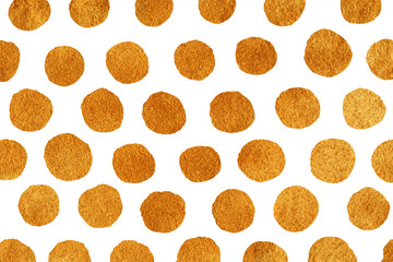 Golden hand painted polka dot background.