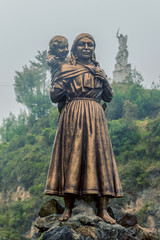 Colombian Statue Representing A Mother With A Child