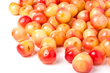 yellow cherries isolated on white background
