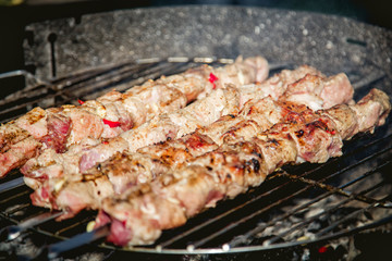 cook meat on the grill, barbecue, kebab