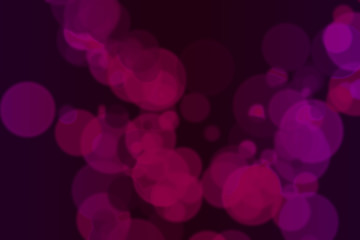 Colourful abstract bokeh design on a black background