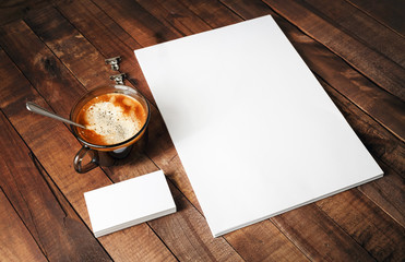 Blank paperwork template for designers. Responsive design mockup on vintage wooden background....