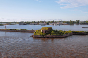 Fototapeta na wymiar Destroyed fort and harbor, Kronstadt. St. Petersburg, Russia