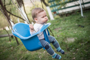 Baby girl on swing