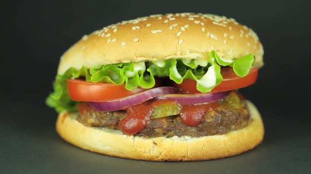 Hamburger on black background.