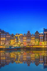 Foto auf Glas Amstel river, canals and night view of beautiful Amsterdam city. Netherlands © boule1301