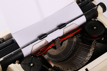 typewriter with paper sheet. Space for your text, close up
