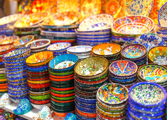 Fototapeta na wymiar Colorful various ceramics on turkish bazaar.