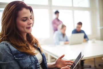 Businesswoman using digital tablet