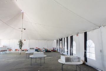 Inside a large white tent for entertaining