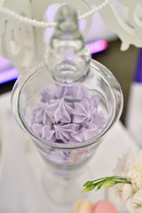 Beautiful wedding restaurant for marriage. White decor for bride and groom. Colorful decoration for celebration. Beauty bridal interior. Bouquet, food and flowers in hall