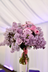 Beautiful wedding colorful bouquet for bride. Beauty of colored flowers. Close-up bunch of florets. Bridal accessories. Female decoration for girl. Details for marriage and for married couple