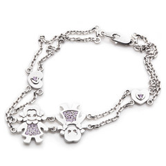 Naklejka na ściany i meble bracelet for children and kids with white gold and figures and gem on the white background