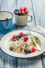 Homemade dumplings with fresh berries