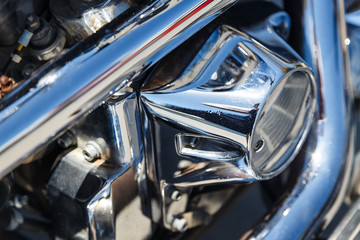 chrome shiny coating motorcycle engine close-up reflection