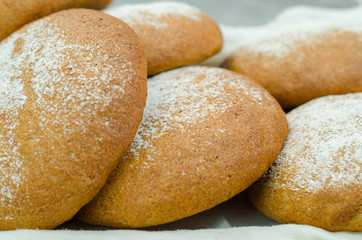 Selection of delicous bread buns lying in basket, as seen from above