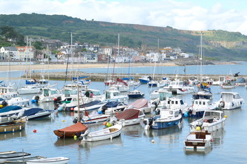 Fototapeta na wymiar Boats in Lyme Regis Harbour, Dorset