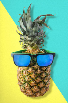 Fun pineapple fruit with summer sunglasses