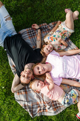 Fototapeta premium Family playing in the park