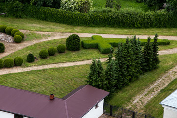 View of the  garden with a living rosary in the park next to the