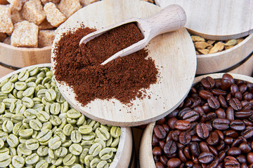 Coffee and coffee ingredients in wooden barrels