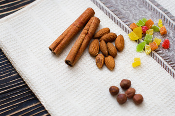 Nuts and candied fruits on the board texture